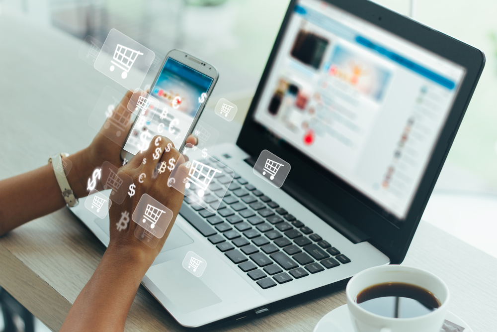 Businesswoman phone and laptop using , online shopping concept.